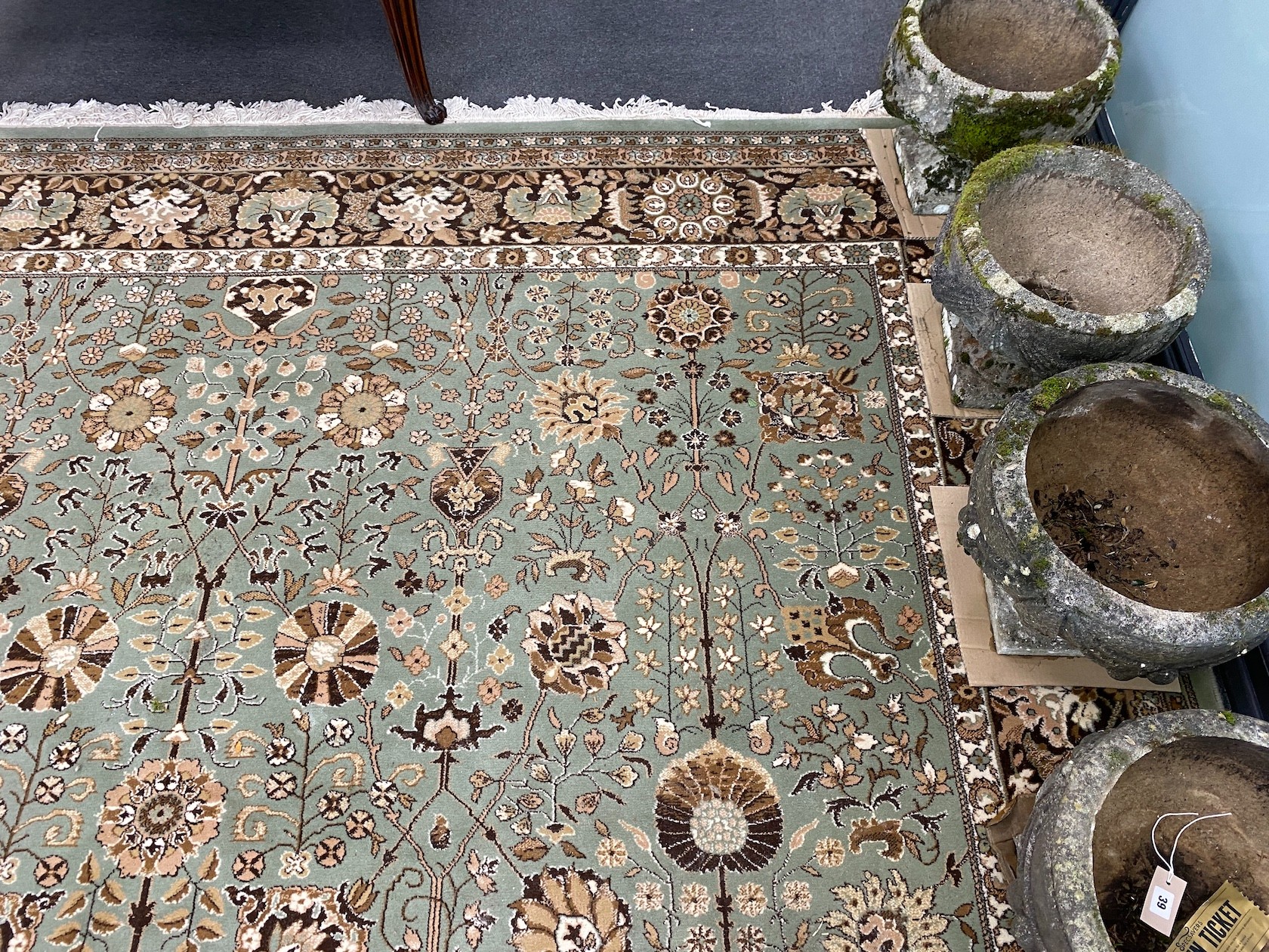 A Tabriz style green ground carpet, 400 x 300cm